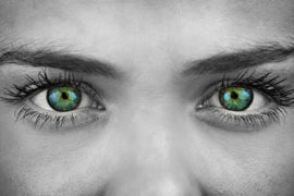 Closeup of a Womans Green Eyes