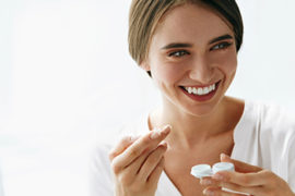 Woman Putting Contact Lenses In