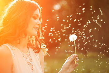 Woman Holding a Flower